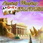 En farverig illustration med antikke bygninger og statuer, kort og teksten Ancient Wonders Solitaire