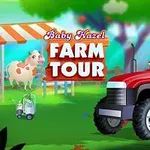 Et barn og en voksen kører en rød traktor foran et skilt og en ko på en farverig gård