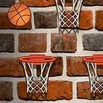 Tre basketballkurve og en basketball på en murstensvæg