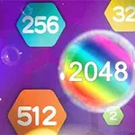 Farverige hexagoner med tal som 256, 32, 64, 512 og 2 omkring en central regnbuefarvet cirkel med tallet 2048