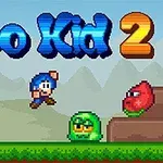 Pixelkunst med en blåhåret figur, en skattekiste og animerede fjender i et skovlandskab med teksten Bloo Kid 2
