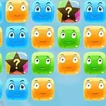Farvede smiley-ansigter arrangeret i et gittermønster med nogle med stjerner og spørgsmålstegn