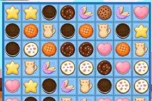 Et gitter med forskellige småkageformer, herunder stjerner, katte, hjerter og chokoladecookies