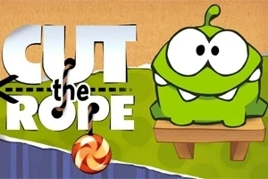 En grøn, tegneserieagtig figur med store øjne sidder på en træplatform ved siden af et slikstykke, mens teksten Cut the Rope er i baggrunden