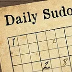 En delvist udfyldt sudoku-puslespil med en fjerpen på gammeldags papir