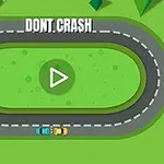 To biler på en oval grå racerbane omgivet af grønne områder med teksten DONT CRASH øverst