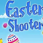 Blå tekst med ordene Easter Shooter mod en lyseblå himmel med påskeæg og skyer