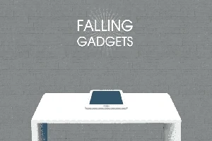 En tablet ligger på et hvidt bord med teksten Falling Gadgets på en grå baggrund