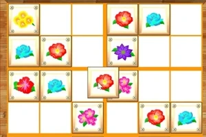 Blomster i forskellige farver placeret i et grid på 5x5 felter med tomme og fyldte positioner