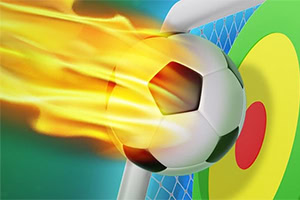 En fodbold med flammer rammer et mål med farvede ringe