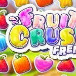 Farverige bogstaver med teksten Fruit Crush Frenzy omgivet af forskellige frugter som jordbær, æbler og appelsiner