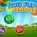 Frugter med ansigter svæver over en grøn mark med en blå himmel og en vindmølle i baggrunden, mens teksten Fruit Flip Mahjongg er øverst