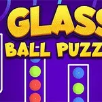 Farverige kugler i glasrør med teksten Glass Ball Puzzle på en lilla baggrund