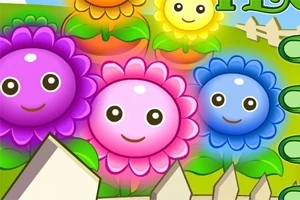Farverige animerede blomster med ansigter, der smiler, i en have med grønne blade og et hvidt stakit i forgrunden