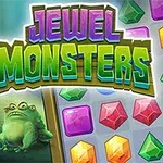Farverige monstre og juveler er vist ved siden af teksten Jewel Monsters på en skovbaggrund