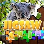 En koala, der kigger gennem en delvist samlet puslespilsramme med teksten Jigsaw Jam Animal foran