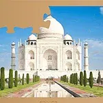 Et puslespil med Taj Mahal som mangler en brik i øverste venstre hjørne