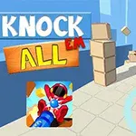Robotfigurer bliver skudt med en bold, mens de er omkring stabel af kasser, med teksten Knock Em All i øverste venstre hjørne