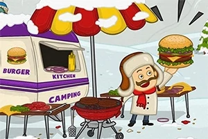 Mand i vinterbeklædning laver burger ved en grill ved siden af en campingvogn i sneen