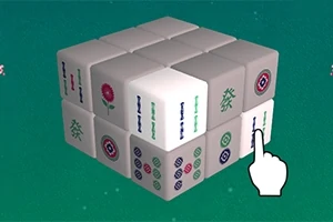 Tredimensionel kube bestående af mahjong-brikker med en animeret hånd, der peger på en af brikkerne