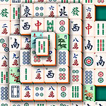 En blanding af mahjong-brikker med forskellige symboler og farver arrangeret i lag over hinanden på en grøn baggrund