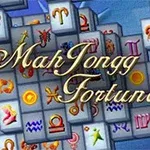 Brikker med astrologiske symboler og teksten MahJongg Fortuna ovenpå