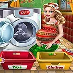 En gravid kvinde står ved siden af en vaskemaskine med åbne døre og to kurve mærket Toys og Clothes foran hende