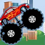 Rød monstertruck med flammer på siden kører gennem en by med skyskrabere i baggrunden