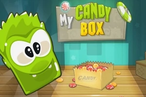 Grønt tegneserieagtigt væsen ved siden af en kasse fyldt med slik, med teksten My Candy Box øverst
