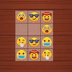 Fire rækker og tre kolonner fyldt med forskellige emojis på et bræt med træbaggrund