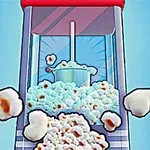 En popcornmaskine fyldt med friskpoppede popcorn mod en blå baggrund
