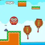 Et farverigt retro-platformspil med en lille karakter, en daruma-dukke, lanterner og skyer mod en blå himmel