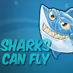 En tegneseriehaj med et stort grinende ansigt, svømmer i en blå baggrund med teksten Sharks Can Fly