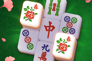 Mahjong-brikker med blomster- og kinesiske symboler på en grøn baggrund