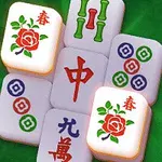 Mahjong-brikker med blomster- og kinesiske symboler på en grøn baggrund