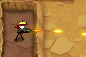 En figur med bandana affyrer et våben i en klippegang med sten og jord