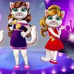 Tre animerede katte med tøj står på en scene foran et publikum med farverige lys i baggrunden