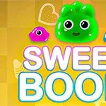 Søde farverige geléfigurer med store øjne over teksten Sweet Boom på en gylden baggrund