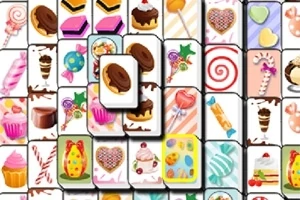 Et mønster af farverige fliser med illustrationer af kager, slik og desserter i et tætpakket layout