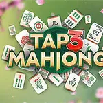 Mahjong-brikker med farverige symboler omgiver teksten Tap 3 Mahjong på en grøn baggrund med pink blomster