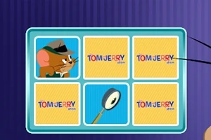 The Tom and Jerry Show: Memory Mischief Et kortlayout med fem kort, hvoraf et viser en mus iført hat og jakke, et andet viser et forstørrelsesglas, og de resterende viser tekstlogoet Tom and Jerry Show