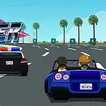 To biler, en med politilys og en blå sportsvogn, kører på en palmetræsbeklædt motorvej under en blå himmel