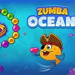 En farverig, tegneserieagtig fisk med en pirathat svømmer ved siden af en kæde af farvede perler under vandet, med teksten Zumba Ocean i baggrunden